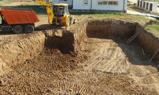 Рытье котлованов под фундамент в Костомукше – цена от 2625 руб. за м3 | 2Землекопа-Ктм